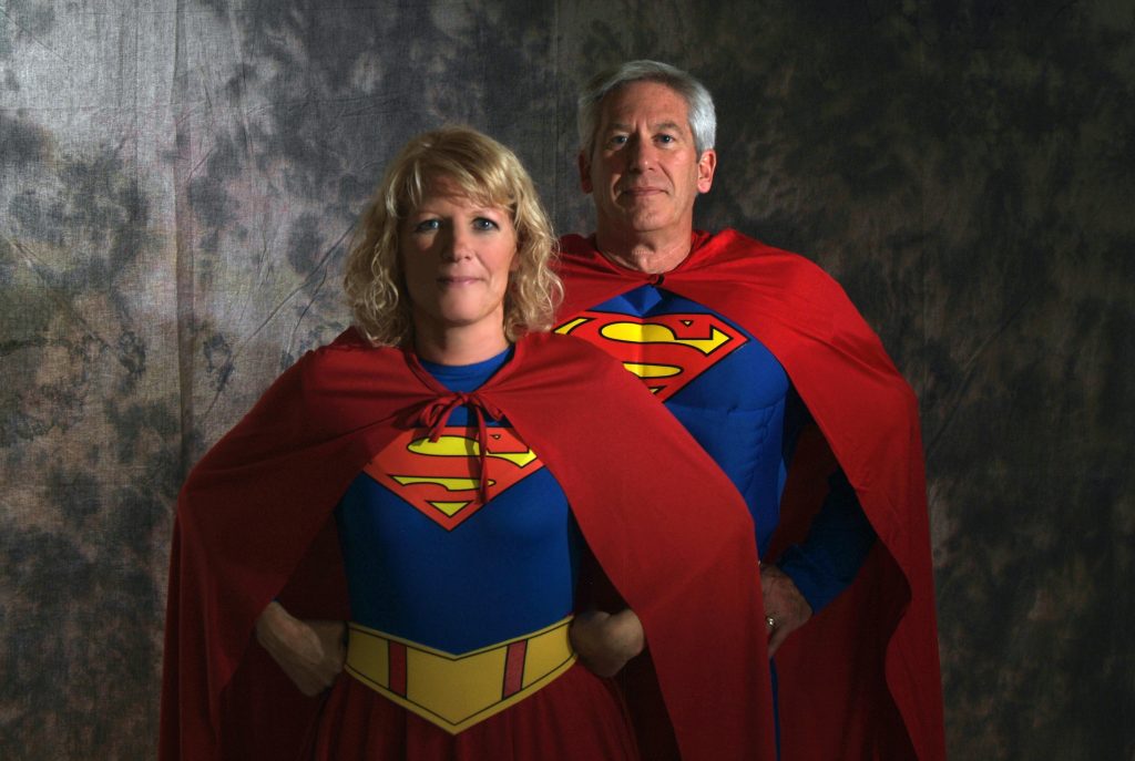 superman and woman costumes